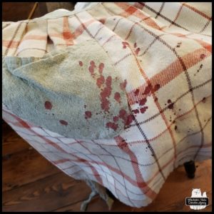 The Cook's head injury blood spatter on apron