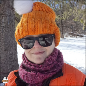 Amber selfie in layers of winter clothes outside in snow