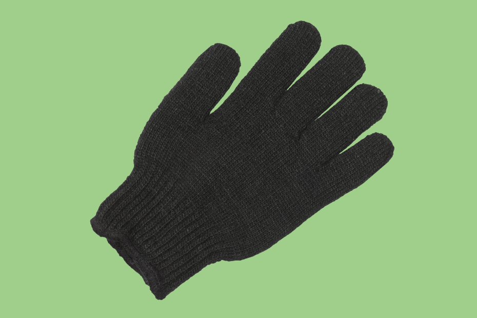 Canva stock photo of a glove against a green background