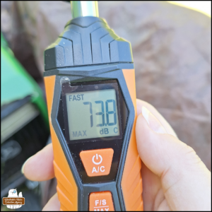 The display of a sound meter showing 73.8 decibels, the max in a few seconds of listening to noise pollution in the backyard